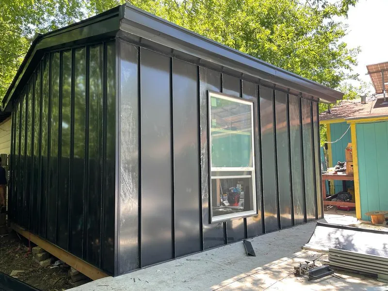 Black standing seam metal wall panels for Roof Inspection in Spring Valley Lake